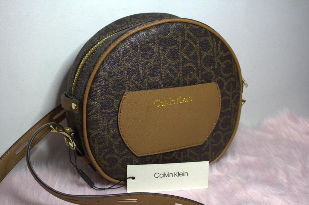 Calvin Klein Round Signature Crossbody in Brown