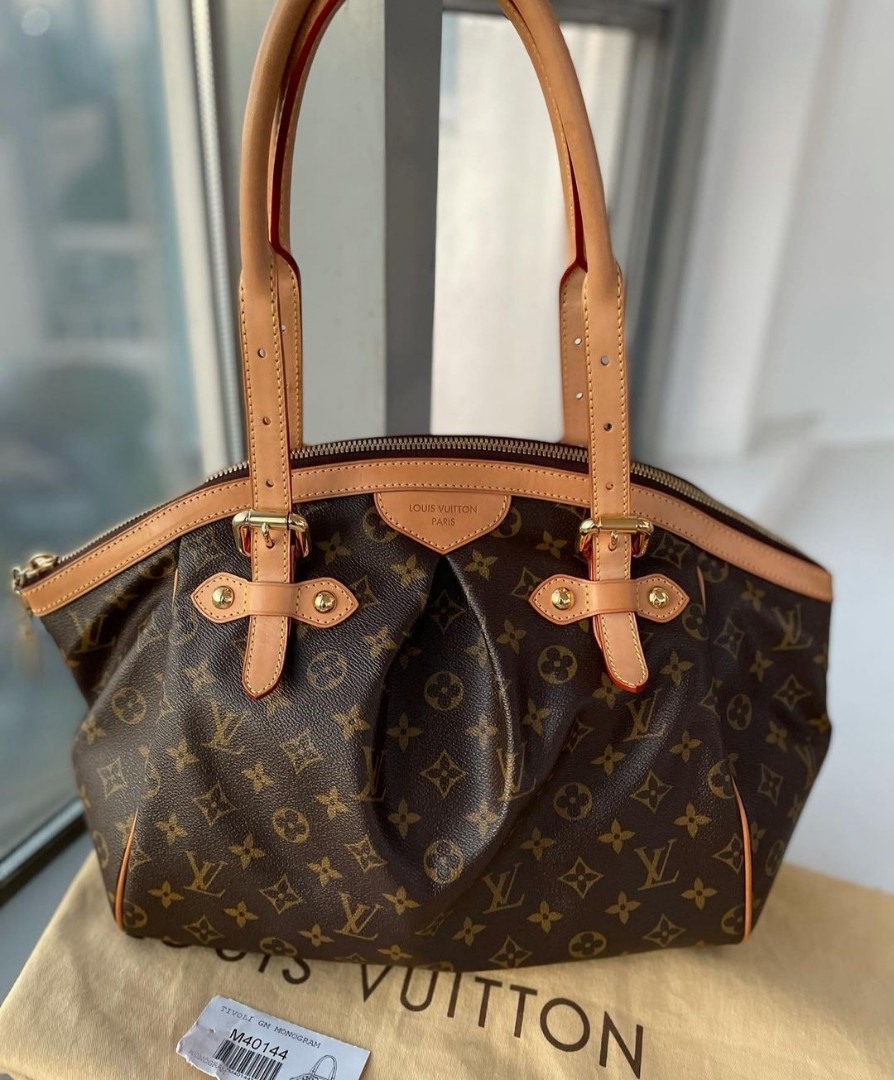 Sold at Auction: AUTHENTIC LOUIS VUITTON TIVOLI GM MONOGRAM CANVAS LEATHER  HAND BAG