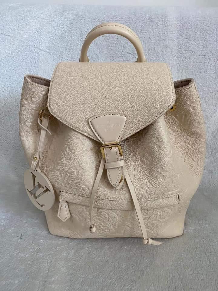 LV Montsouris Backpack (Category: Luxury Bags & Wallets) located in Manila. Submitted by bagislifeshop (Listing ID 1146983341, Image 2). Description: ▪️Louis Vuitton Montsouris backpack▪️ ✔️In transit to Manila ✅Date code: CA2240 ✅Color: Créme ✅Material: monogram Empreinte leather ✅Condition: 9/10 ✅Inclusions: dust bag and cards..