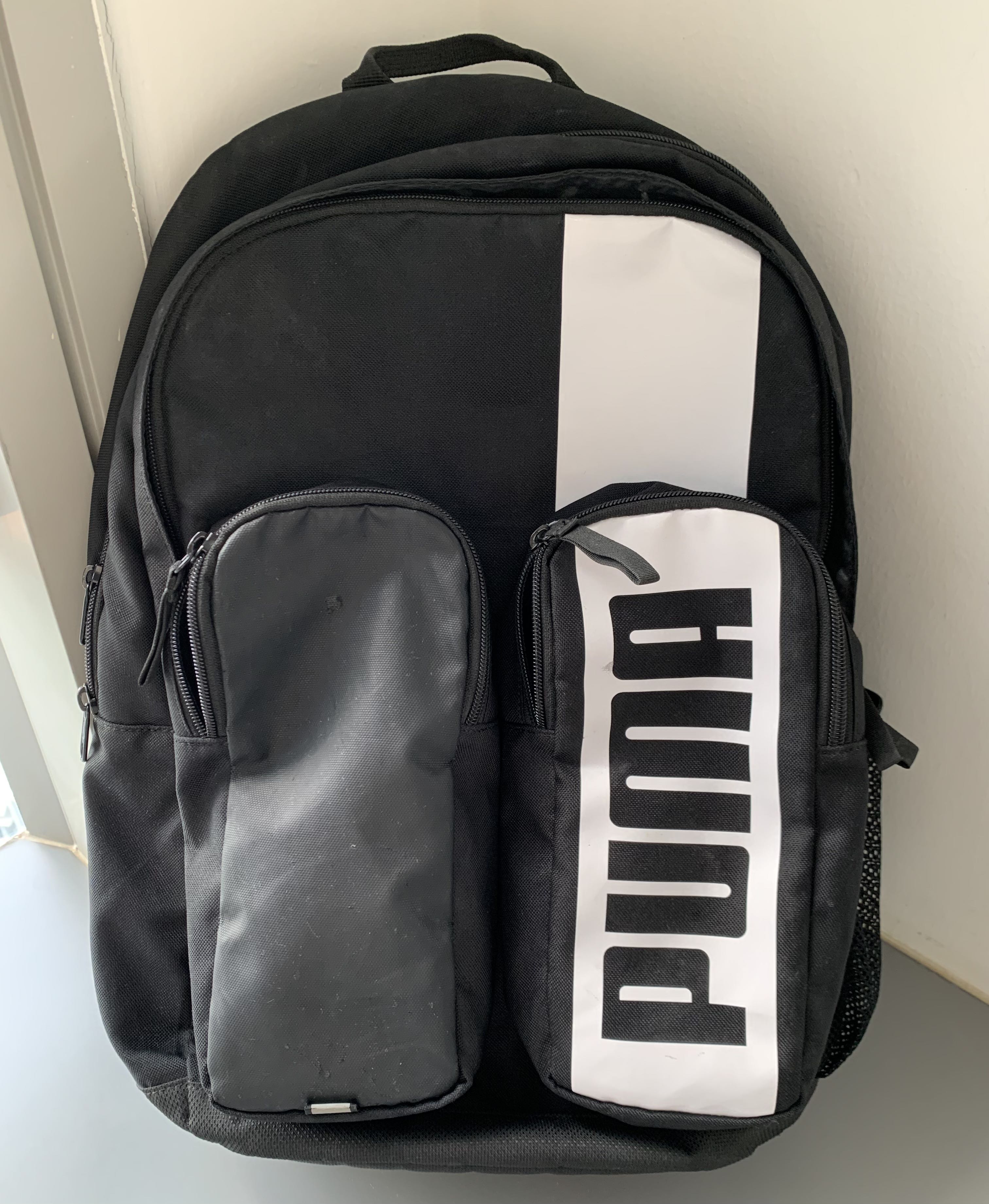 gray puma backpack