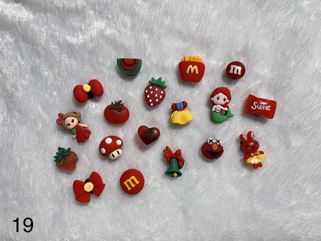 SOLD PER PACK CROCS CHARMS/JIBBITZ RED #19 ♥️ (Category: Shoe inserts) located in Pasig City. Submitted by mingmingbuys (Listing ID 1147089922, Image 1). Description: FIXED PRICE MGA SISZT. NAGMAHAL NA SA SUPPLIER. 20 PCS PER PACK WALA PONG PILIAN. CUTE PO ANT QUALITY. LOWEST PRICE PADIN MGA SIS. PM ME IF YOU HAVE QUESTIONS. 🥰.