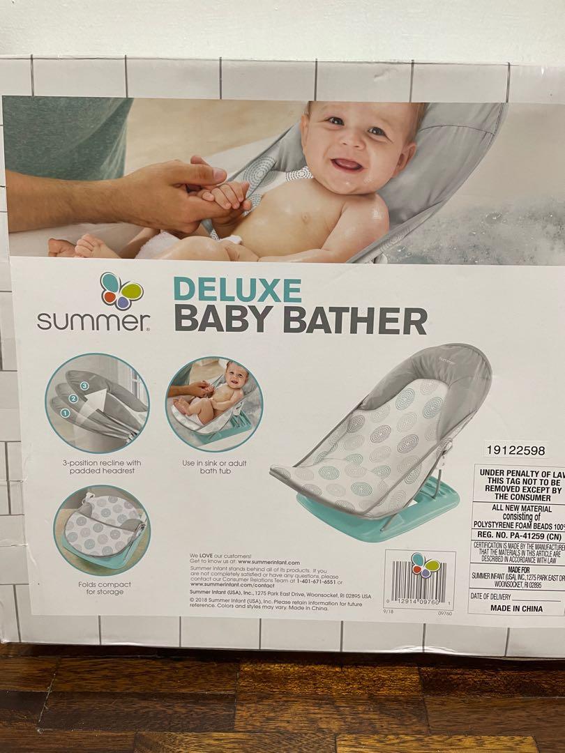 Summer deluxe baby bather (Category: Bathtub & Bath Accessories) located in Paranaque City. Submitted by tealandsagecloset (Listing ID 1146981969, Image 2). Description: DETAILS :Dashed dots print : 3-position recline, for child’s comfort :For use in the sink or adult bathtub :Head support cradles baby’s head :Folds compact for storage and travel :Machine washable fabric PRODUCT DIMENSION :H 34.29cm x W 21.75cm x D 55.88cm :Weight: 1.6kg :Minimum