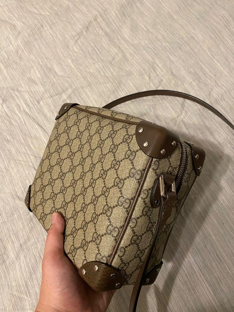 gucci trunk purse