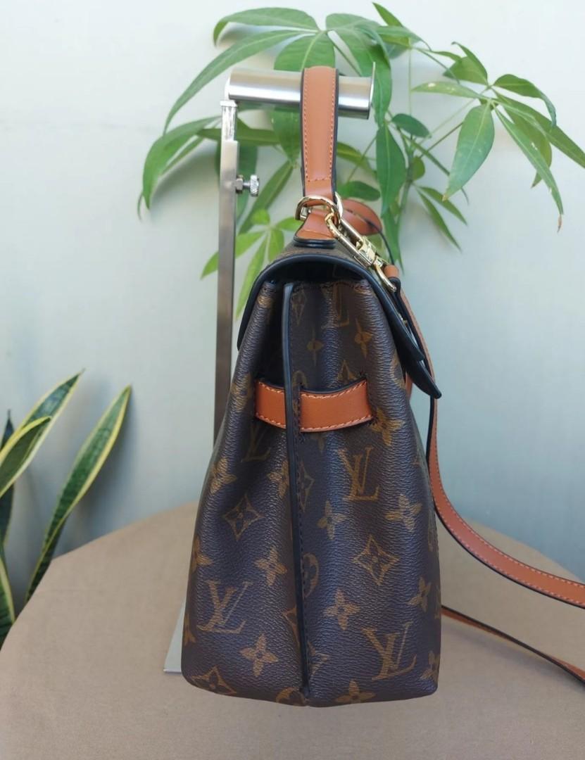 Sold at Auction: A Louis Vuitton Speedy Bag. LV canvas with brown leather  trim and handles. Lock with keys. Red textile interior. The top zip works  but is missing the puller. Please