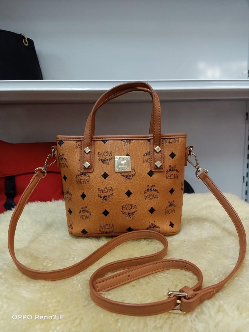 MCM MUNCHEN SLING BAG, Luxury, Bags & Wallets on Carousell