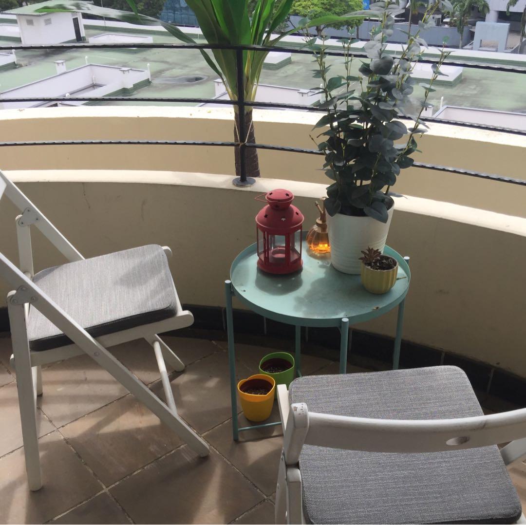 Outdoor Ikea used small grey table with 2 x white chairs. Note as shown in photos chairs have