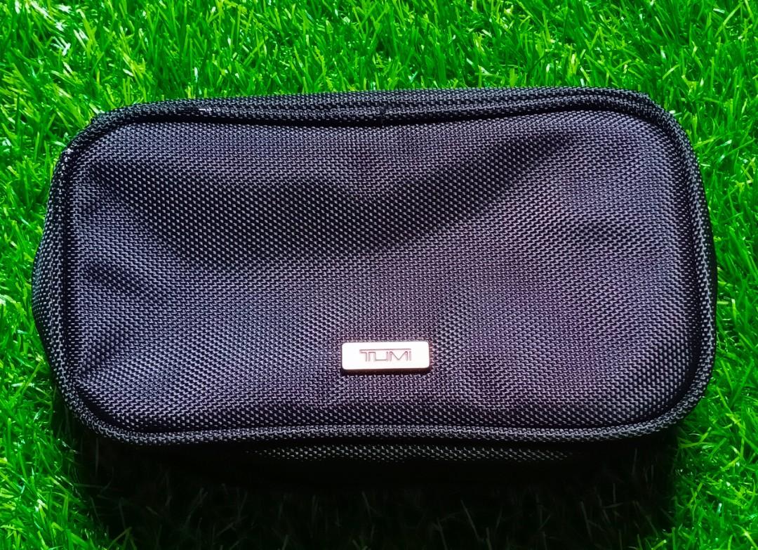 tumi men's clutch bolsa