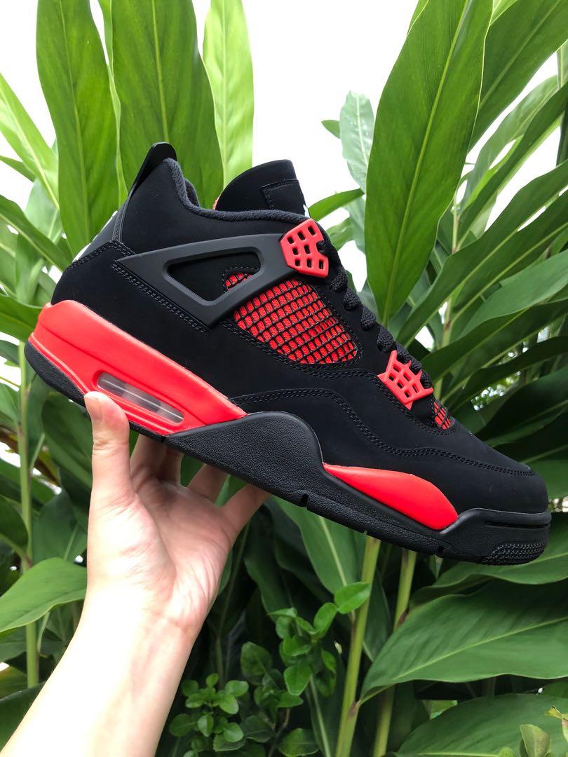 Black red and top green jordan 4