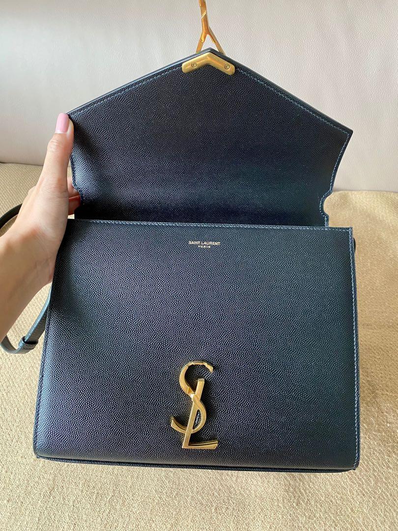 CASSANDRA Medium top handle bag in grain de poudre embossed leather, Saint  Laurent