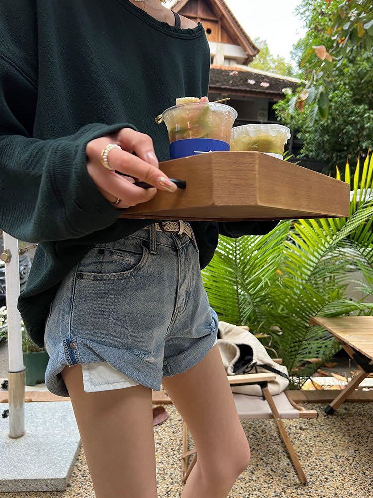 Jean shorts pockets hanging out on sale
