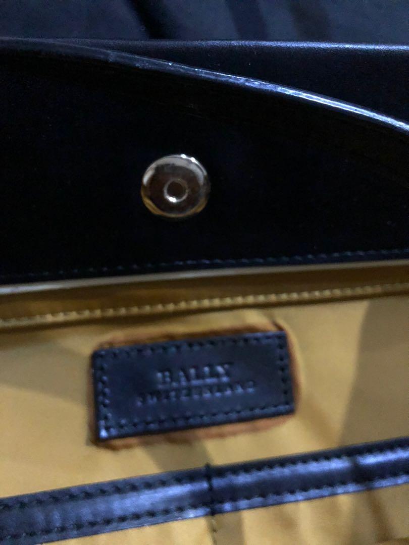 Authentic Bally Nylon Bag (Category: Tote Bags) located in Mandaluyong City. Submitted by ricaley (Listing ID 1147624966, Image 3). Description: From Japan Auction (still with tag from the auction) With Dustbag Like new except for the stains. Bigger stain at the back of the bag so not that visible. Please see pic. Slightly negotiable..