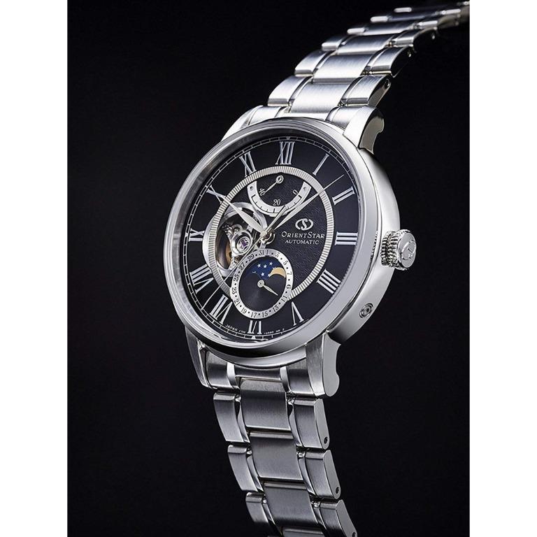 Orient Star Open Heart Moon Phase Automatic Watch RE-AM0004B00B (Category: Luxury Watches) located in San Juan City. Submitted by wilderness.voice (Listing ID 1147562616, Image 2). Description: Delivering unbeatable craftsmanship and innovative functionality, this ORIENT 41mm mechanical watch displays an alluring stainless steel and band, showcasing an impeccably crafted blue dial complemented by multiple notable features. The watch is designed w