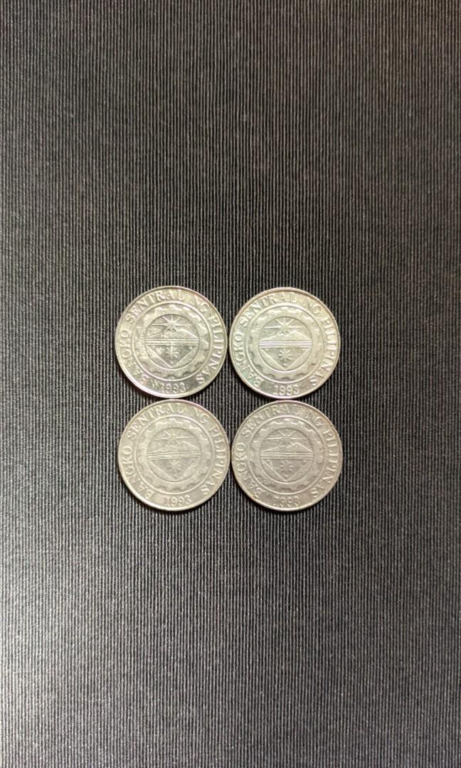 1 Peso / Piso / 2002 Philippine coin (Category: Currency) located in Quezon City. Submitted by unravelled (Listing ID 1147727345, Image 3). Description: 1 Peso / Piso / 2002 Philippine coin 1 Remaining Still has that frosty luster Uncleaned.
