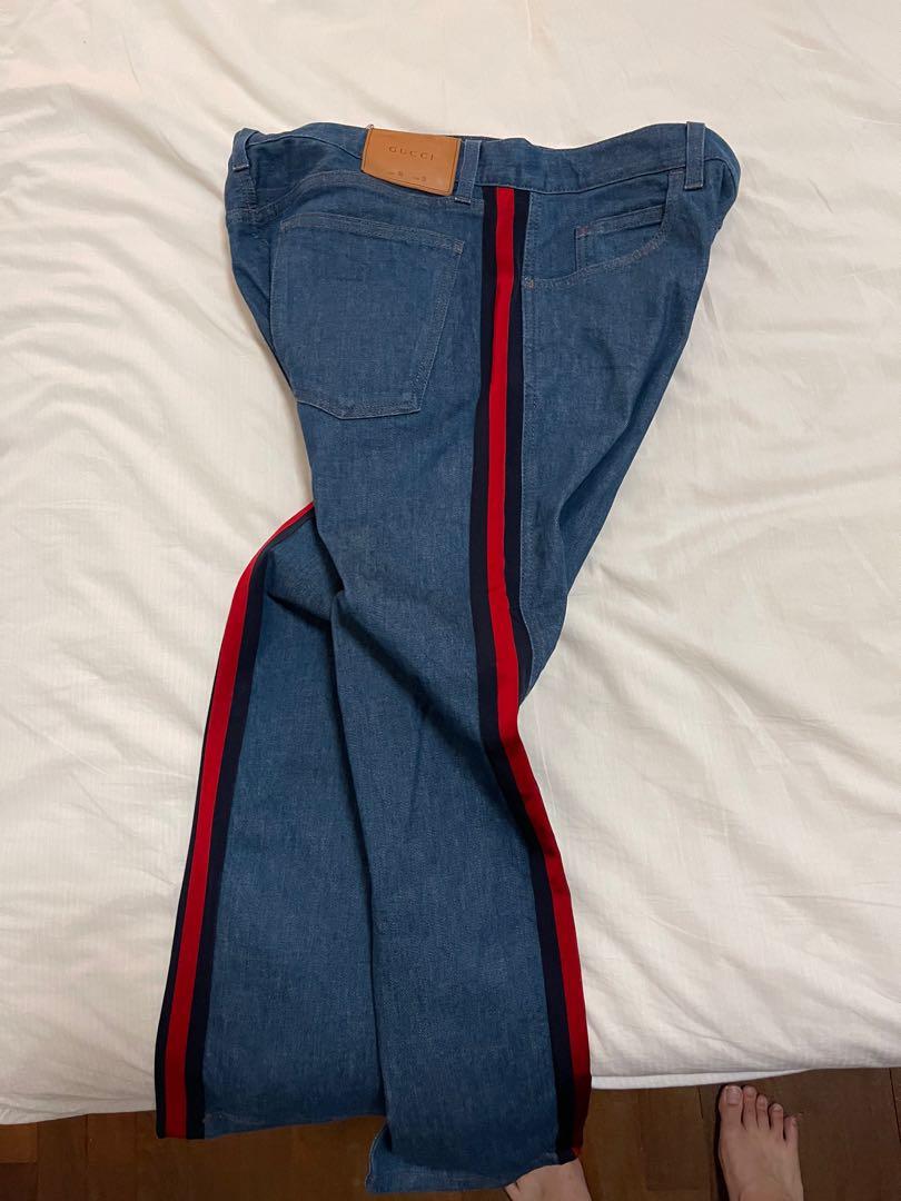 Gucci jeans 2024 with red stripe