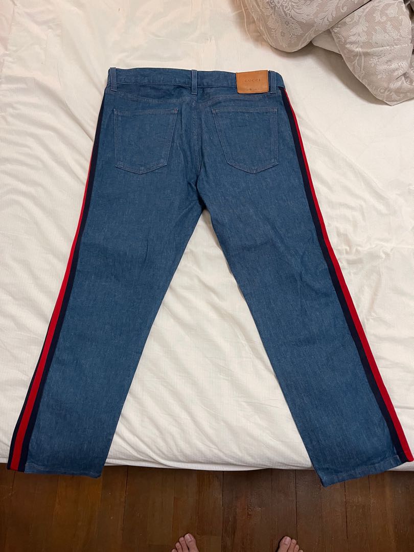 Gucci jeans with red stripe 2025