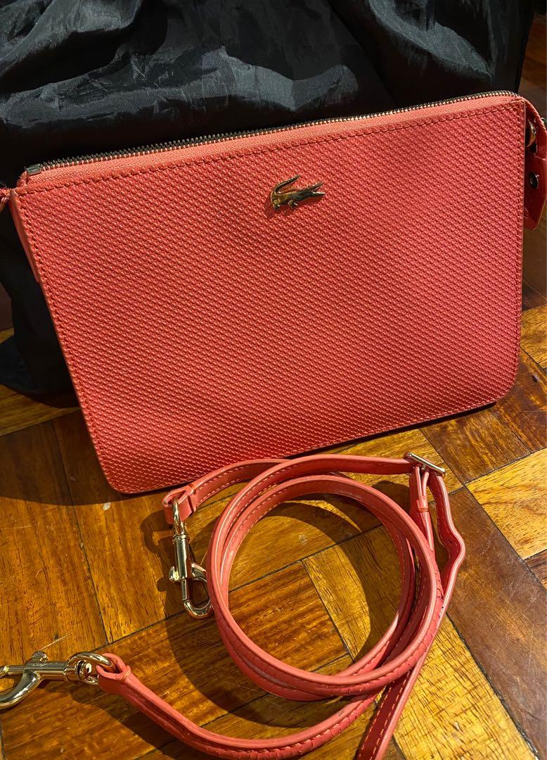 Lacoste trio like celine (Category: Luxury Bags & Wallets) located in Quezon City. Submitted by lux4less4u (Listing ID 1147861799, Image 1). Description: Lacoste trio similar design with celine trio the bag is almost new there is a slight flaw on the sling due to storage pls check pic 3. Available for pick up via lalamove or grab in qc .