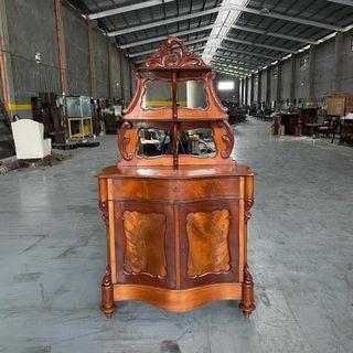 Mahogany Biedermeier bonhuer with mirrors and a carved crest