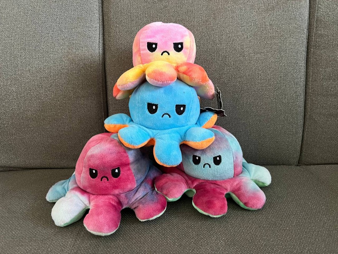 mad and happy stuffed animal