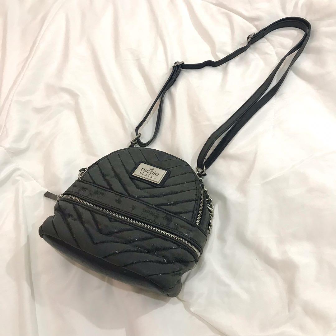 Nicole Shoulder Bag (Category: Shoulder Bags) located in Olongapo. Submitted by sbm07 (Listing ID 1147710132, Image 1). Description: Nicole by Nicole Miller Shoulder Bag. Used twice.@ 480.
