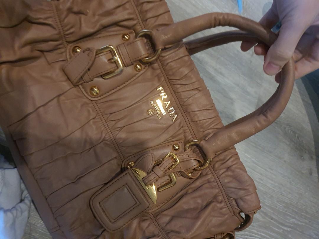 Prada bn1407 beige (Category: Luxury Bags & Wallets) located in Davao. Submitted by bagaholics. (Listing ID 1147779821, Image 1). Description: prada bn 1407 beige nappa lambskin leather.