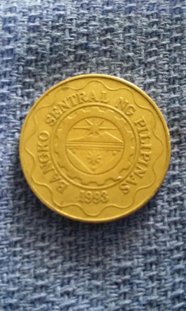 5 piso bsp series 1998(rcm) error coin (Category: Currency) located in Candon. Submitted by sniper_25 (Listing ID 1147999402, Image 3). Description: - 5 piso bsp series 1998(rcm) royal Canada mint(error coin). - extra metal on cogwheel teeth.