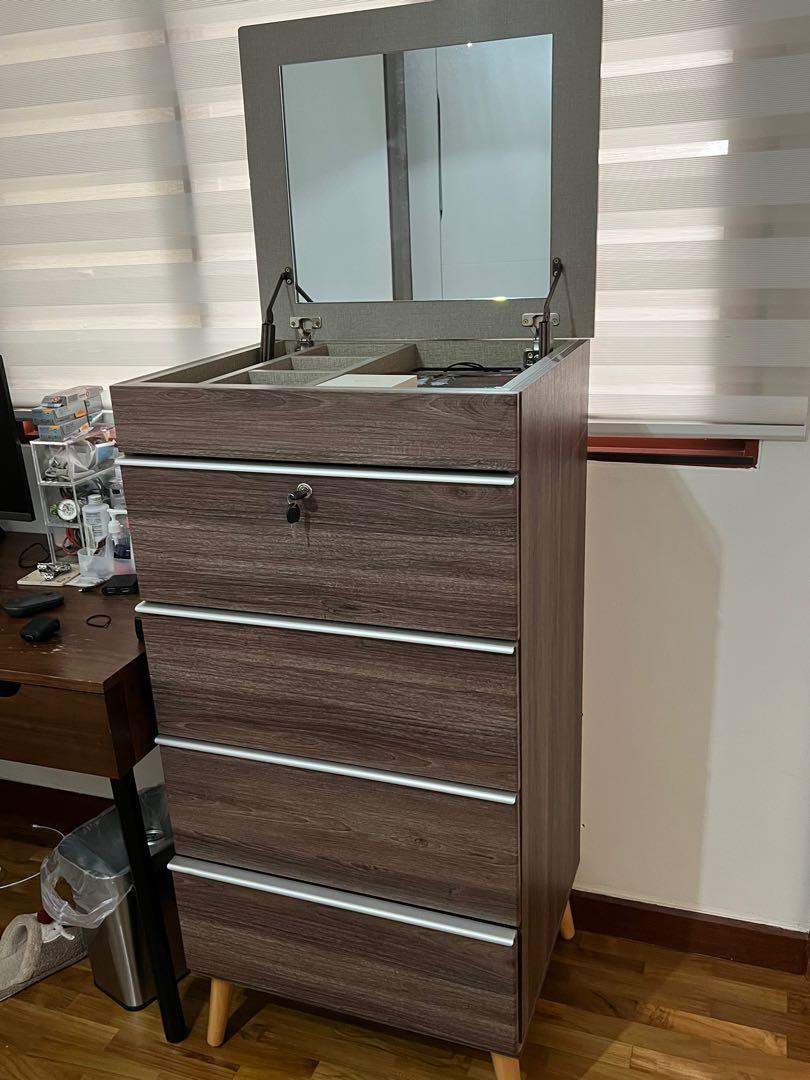 Chest with cheap mirror on top