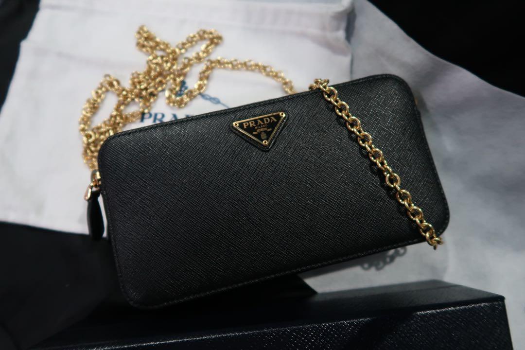 Prada double zip bag with chain (Category: Luxury Bags & Wallets) located in Bocaue. Submitted by declutteting2017 (Listing ID 1142216773, Image 3). Description: used 3x 100% authentic Saffiano leather Box, paperbag, cards, dustbag Store fresh! Bought jan 9, 2022 stamped Sa prada store. Bought this for 52,000. .