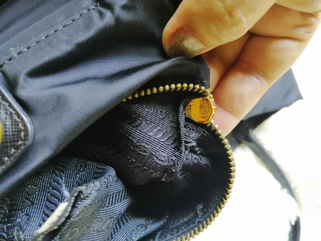 Riri cheap zipper prada