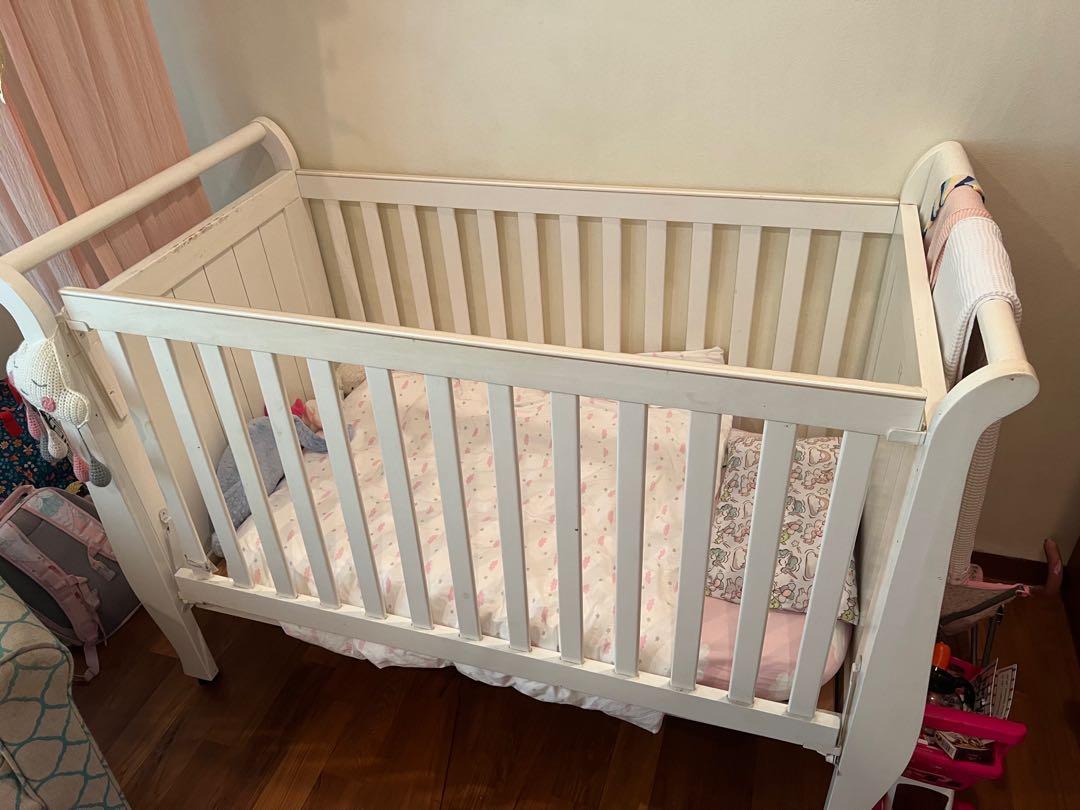 Sleigh shop style crib