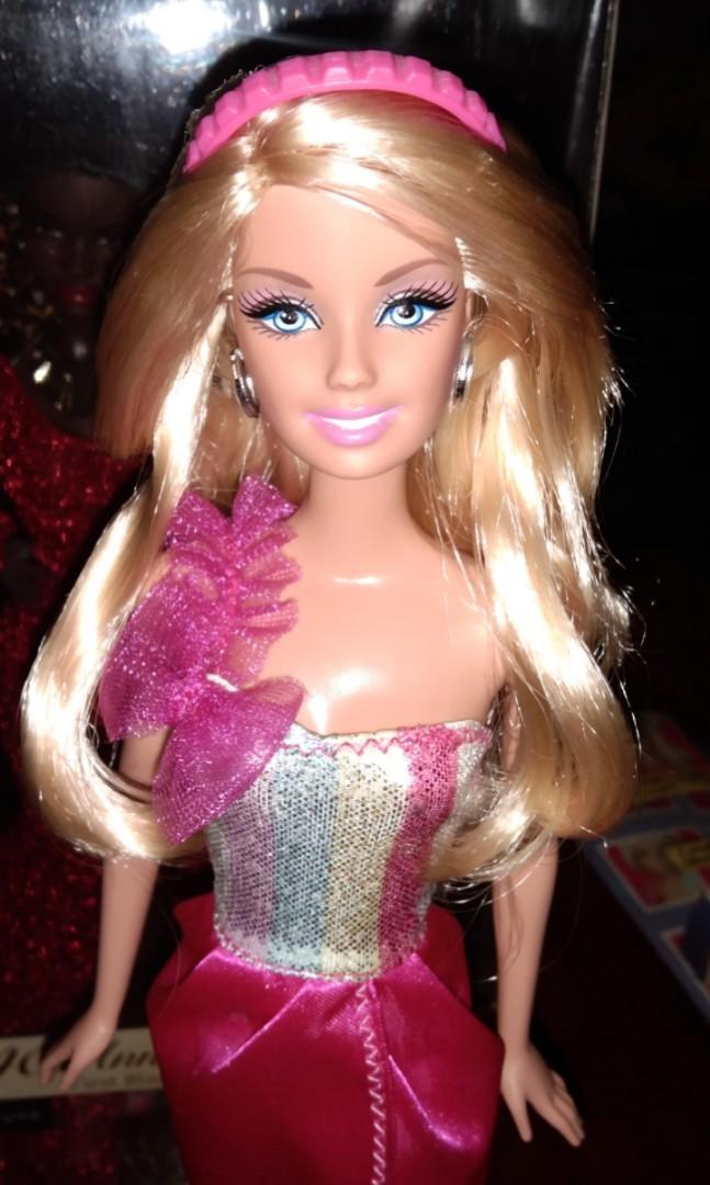 Barbie Cut and Style (Category: Kids Toys) located in Quezon City. Submitted by dekks_sulit (Listing ID 1154327735, Image 2). Description: Barbie Cut and Style. Complete. Displayed inside glass cabinet. Preloved. Payment via Gcash or BDO. Shipping via Grab or Lalamove..