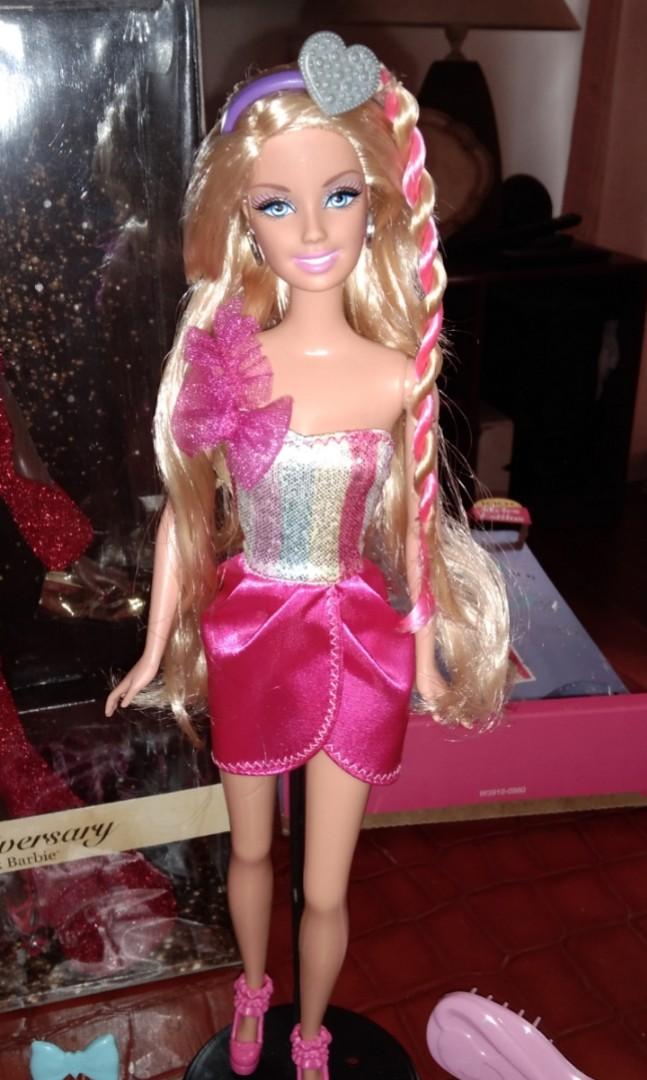 Barbie Cut and Style (Category: Kids Toys) located in Quezon City. Submitted by dekks_sulit (Listing ID 1154327735, Image 3). Description: Barbie Cut and Style. Complete. Displayed inside glass cabinet. Preloved. Payment via Gcash or BDO. Shipping via Grab or Lalamove..