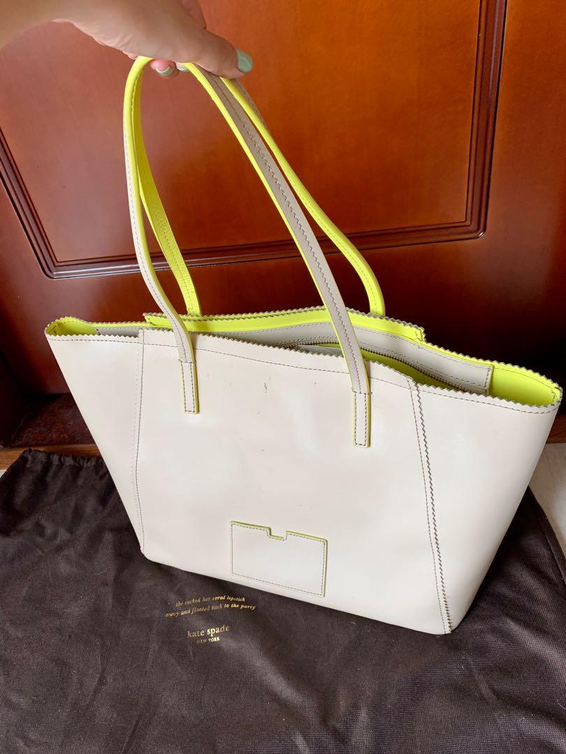Kate Spade Never full bag (Category: Luxury Bags & Wallets) located in Quezon City. Submitted by marysthings (Listing ID 1154275438, Image 2). Description: Cute neon and beige bag. Big and can store a lot of items. Cute pendant charm. Leather scratches and stains (see photo).