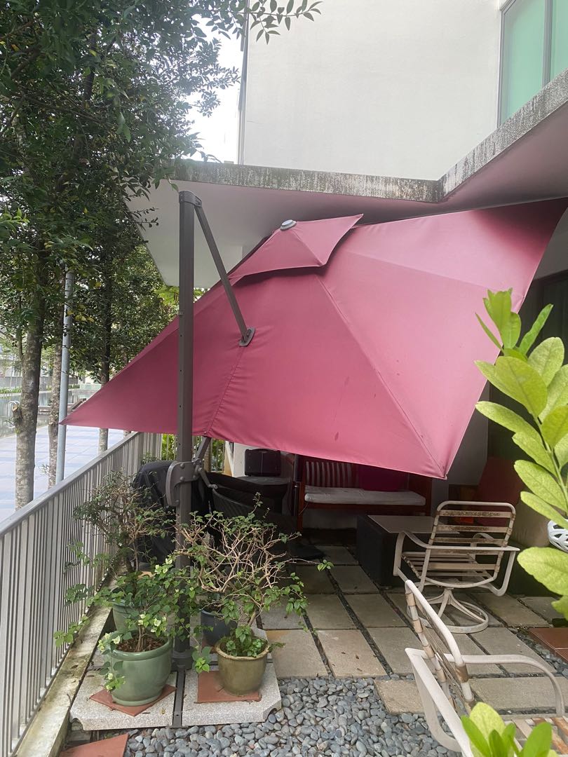 pink patio umbrella with lights