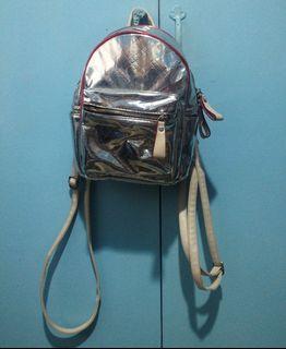 Small metallic backpack