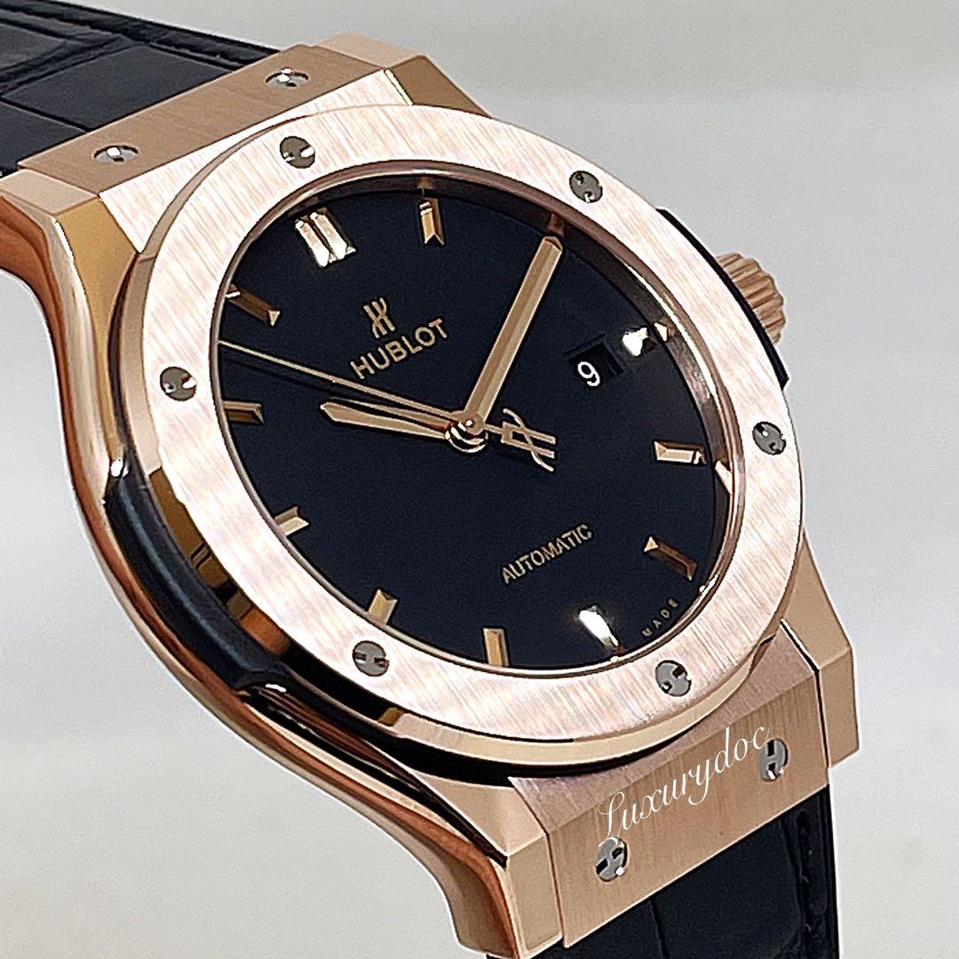 Gold and discount black hublot