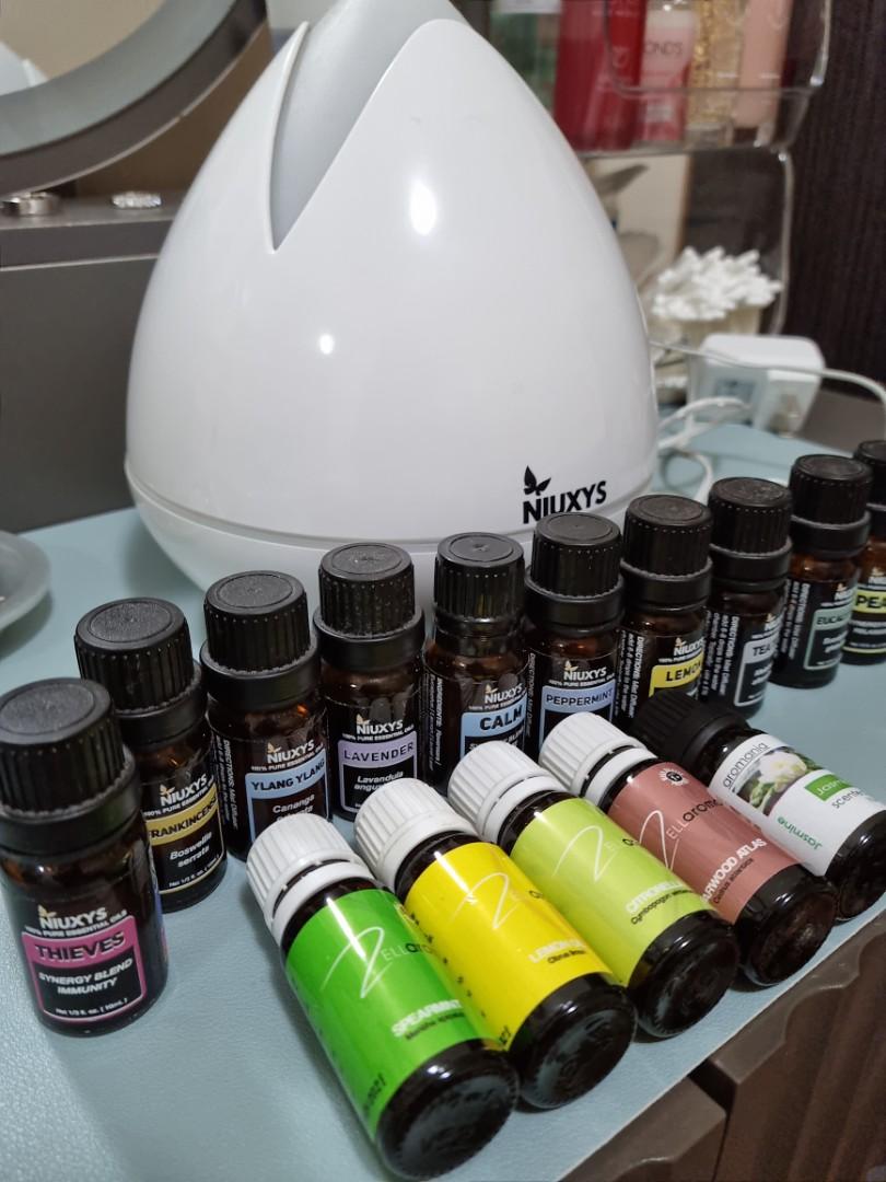 Niuxys Diffuser and Essential Oils Set (Category: Fragrance & Deodorants) located in Manila. Submitted by icabelulia (Listing ID 1154708312, Image 2). Description: for take all only. what you get is everything in the photo. most bottles almost full pa. working in good condition din yung diffuser because bihirang bihira nagamit. niuxys is a local brand that sells quality essential oils :) rfs- not using it anymore :(.