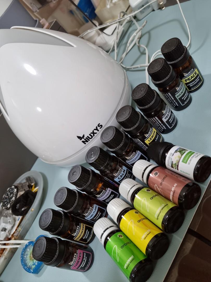 Niuxys Diffuser and Essential Oils Set (Category: Fragrance & Deodorants) located in Manila. Submitted by icabelulia (Listing ID 1154708312, Image 1). Description: for take all only. what you get is everything in the photo. most bottles almost full pa. working in good condition din yung diffuser because bihirang bihira nagamit. niuxys is a local brand that sells quality essential oils :) rfs- not using it anymore :(.