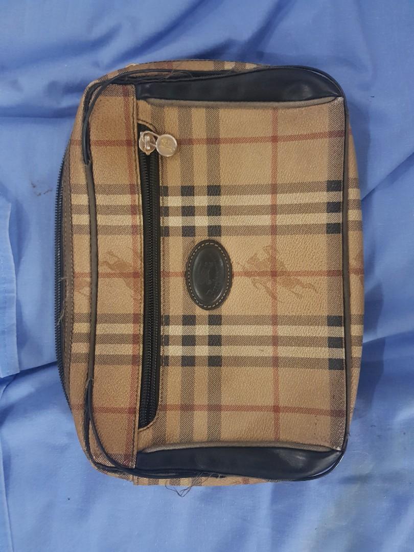 Burberry Clutch bag (Category: Luxury Bags & Wallets) located in Antipolo. Submitted by capizexport (Listing ID 1154809814, Image 1). Description: Burberry clutch bag price 3.5 k heavily used piping needs fixing authentic.