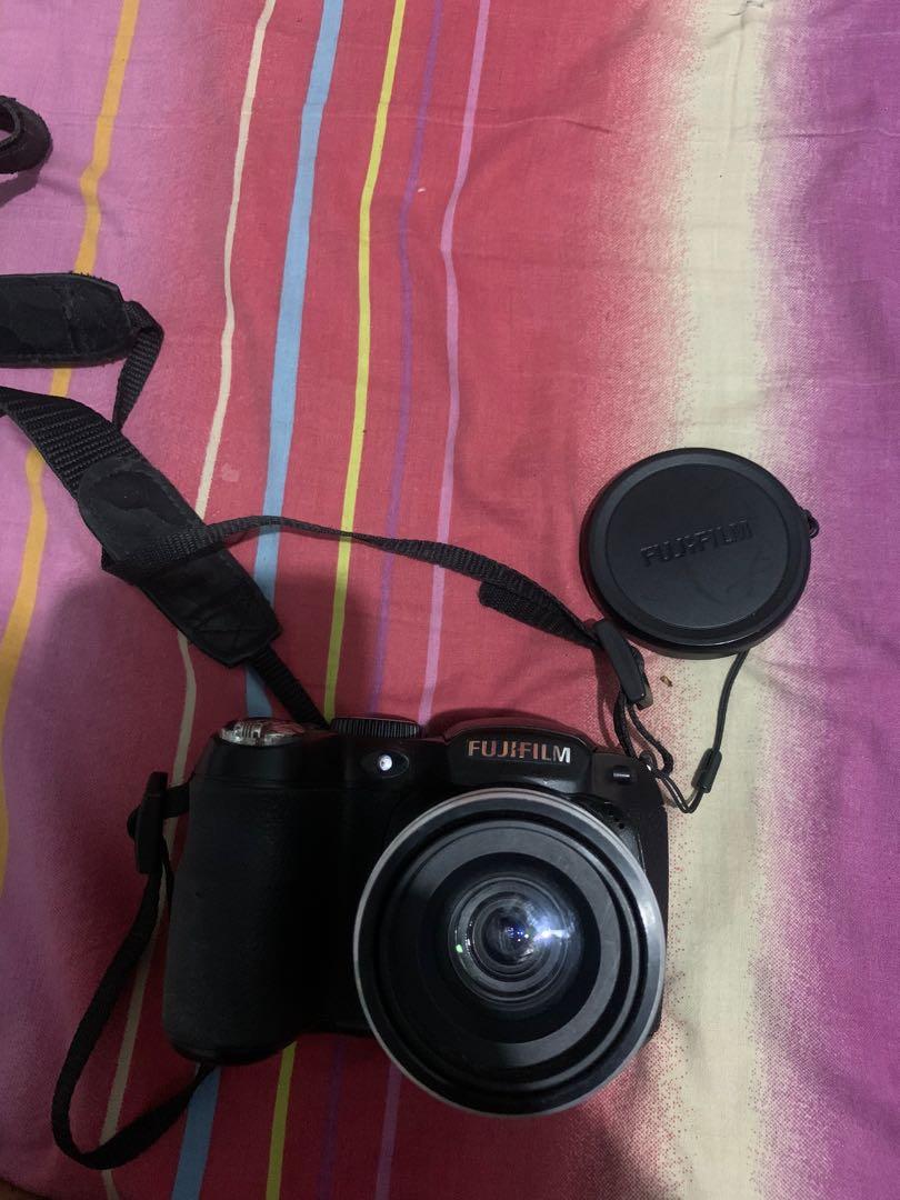 Fujifilm Digital Camera Finepix S with free pouch (Category: Cameras) located in Quezon City. Submitted by probablyblythes (Listing ID 1154898367, Image 1). Description: No damage. Still working but dint have batteries. Gcash plus sf. QC Loc.