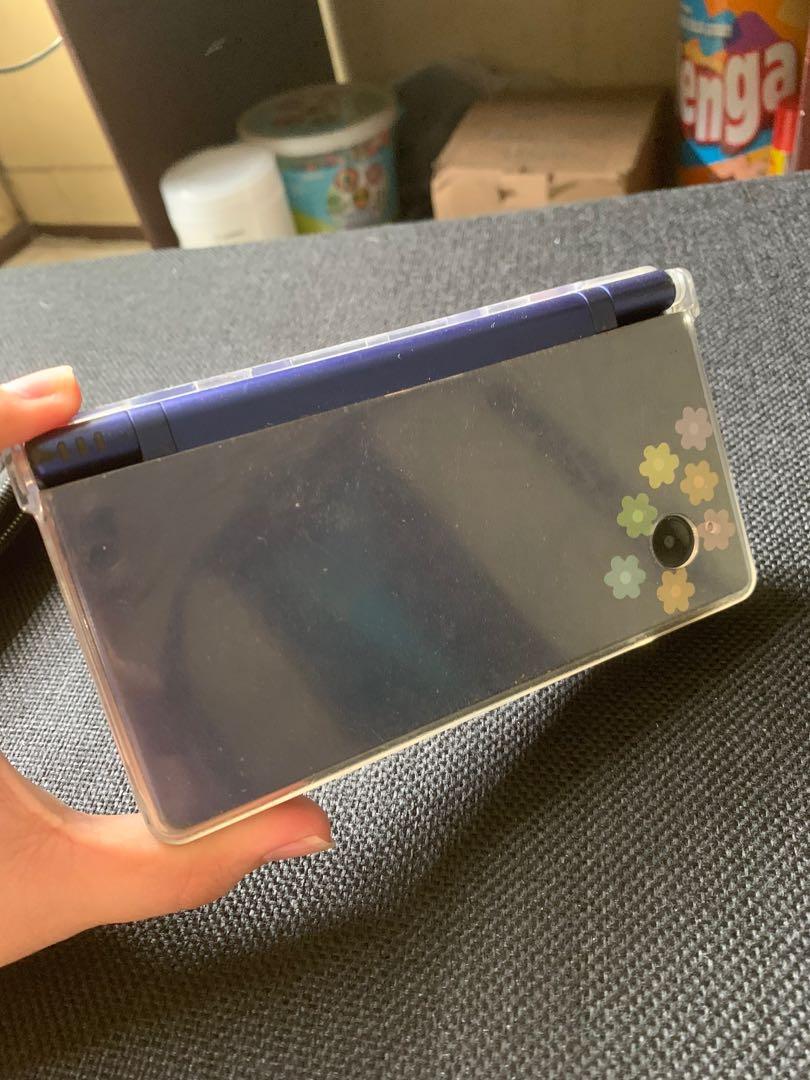 Nintendo DSi with wifi and Camera (Category: Nintendo) located in Muntinlupa City. Submitted by jmmlab (Listing ID 1154797068, Image 2). Description: Nintendo DSi with Camera No charger and pen stylus With 8 games and 3 gameboy games (see photos for the games) Unit is in good condition however there is no charger .