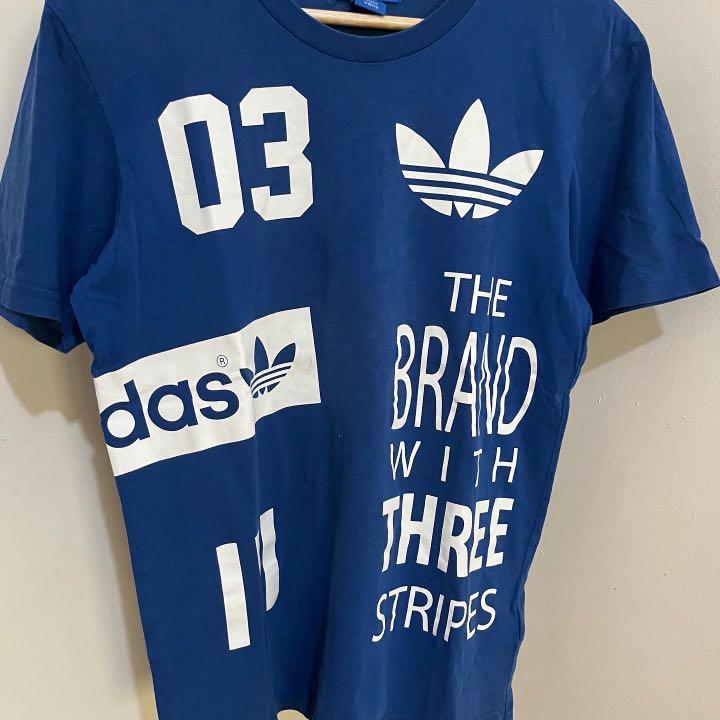 Adidas Originals Blue Tee (Category: Tshirts & Polo Shirts ) located in Angeles City. Submitted by thriftitib (Listing ID 1155006712, Image 3). Description: Adidas Originals Blue Tee Size: Small Dimes: 27L x 19W Condition: 10/10 very good condition Color Rate: 10/10 Defects: stitches at the back but overall like new & no crackprints Mine: P350.
