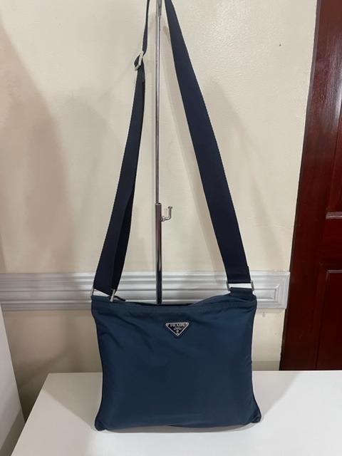 Prada blue sling bag deals
