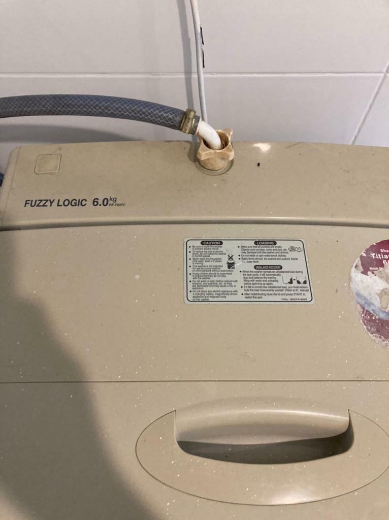 Lg washing machine fuzzy 2025 logic 6.0 kg price