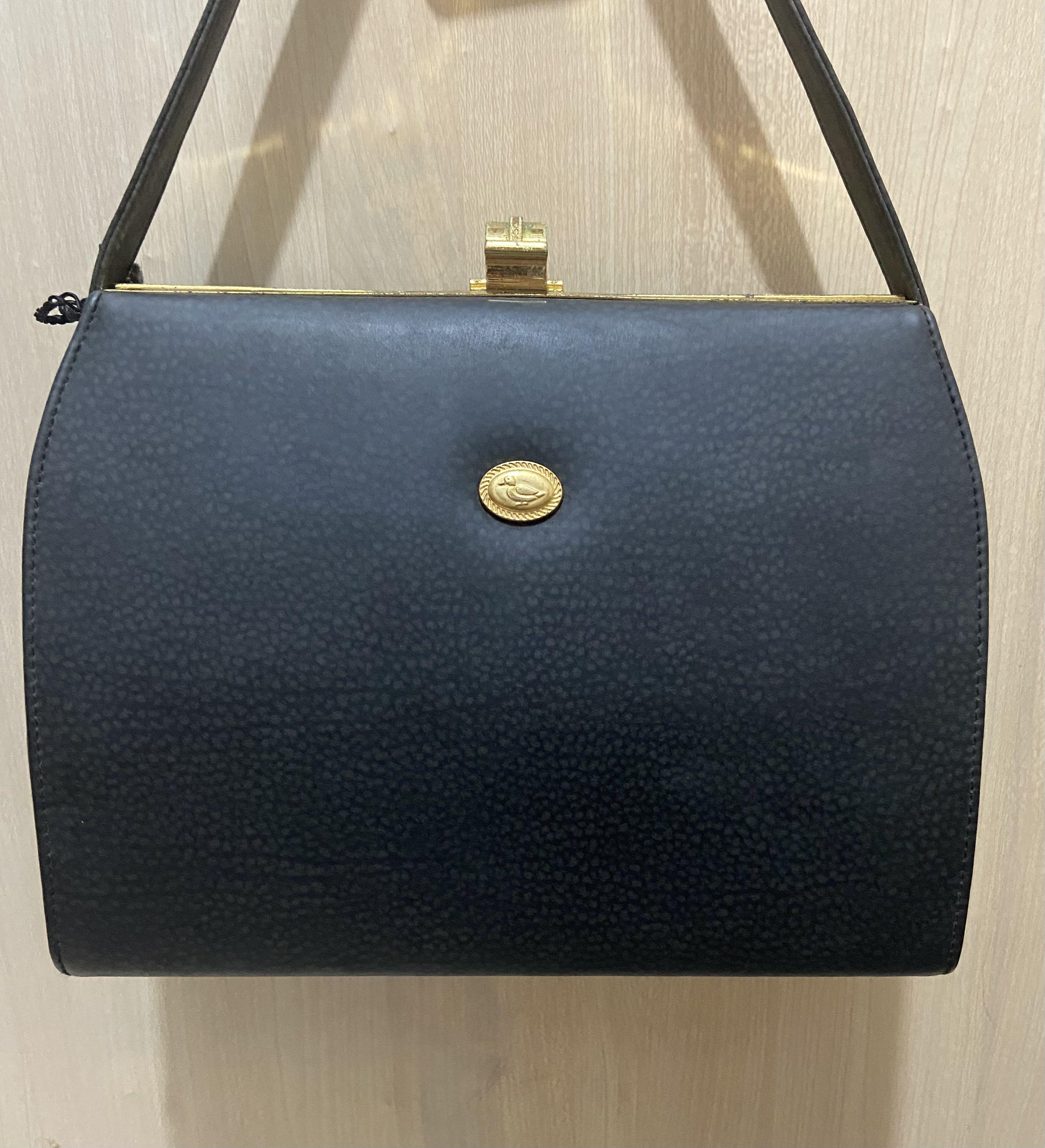 Jade duck handbag store