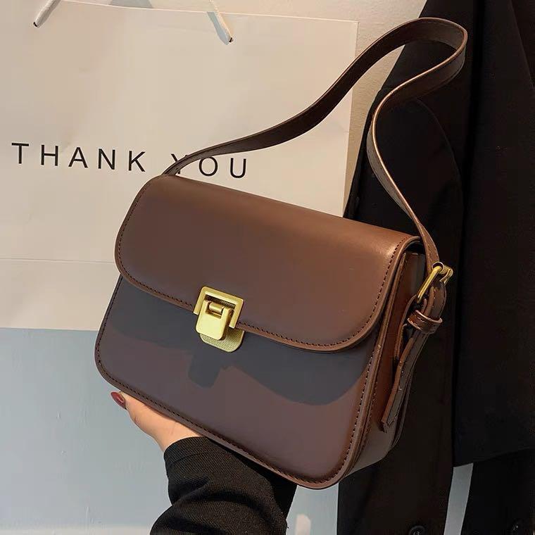 Dark top brown handbag