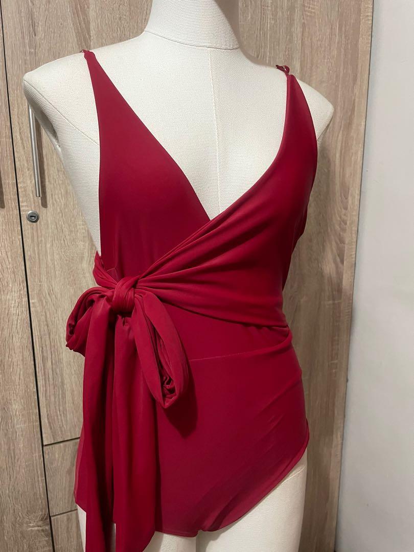 (Repriced) Red one piece swimsuit (Category: Bikinis & Swimsuits) located in Bacoor. Submitted by unit_1509 (Listing ID 1155282440, Image 3). Description: Used once Can pass as new 10/10 condition Fits small Personal fave! Super cute in person Padded Fixed price already RFS Decluttering Shipping c/o buyer via Shopee checkout and J&T.