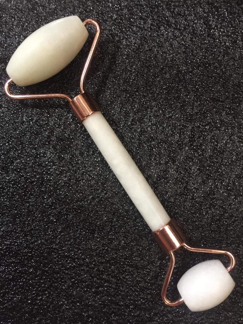 Jade Face Roller - Authentic stone (Category: Face Care) located in Binangonan. Submitted by Love_Jen (Listing ID 1155351062, Image 3). Description: Our White Jade roller for the face made from real jade acts as n excellent Ice massager for eye puffiness relief. The large roller is suitable for the cheeks, neck, chin, and forehead. The small side is mainly used around the eyes. Daily use reduces inflammation and improves your skin stone. Our face