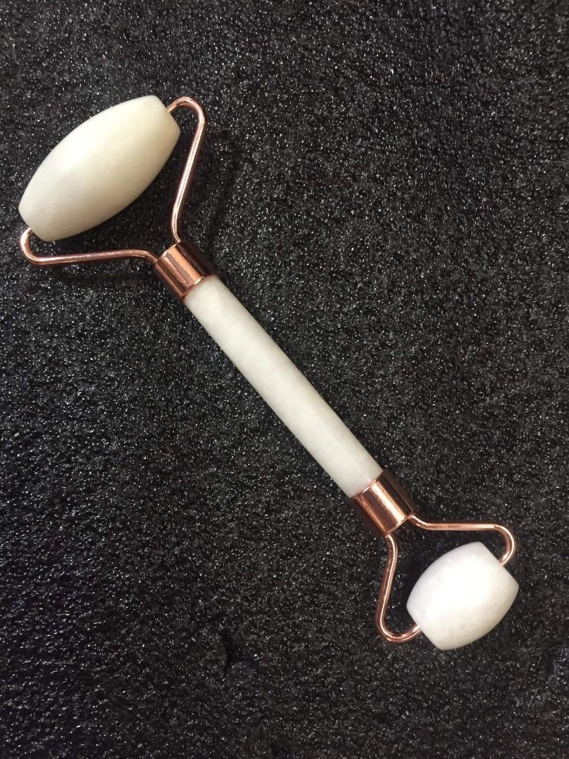Jade Face Roller - Authentic stone (Category: Face Care) located in Binangonan. Submitted by Love_Jen (Listing ID 1155351062, Image 1). Description: Our White Jade roller for the face made from real jade acts as n excellent Ice massager for eye puffiness relief. The large roller is suitable for the cheeks, neck, chin, and forehead. The small side is mainly used around the eyes. Daily use reduces inflammation and improves your skin stone. Our face