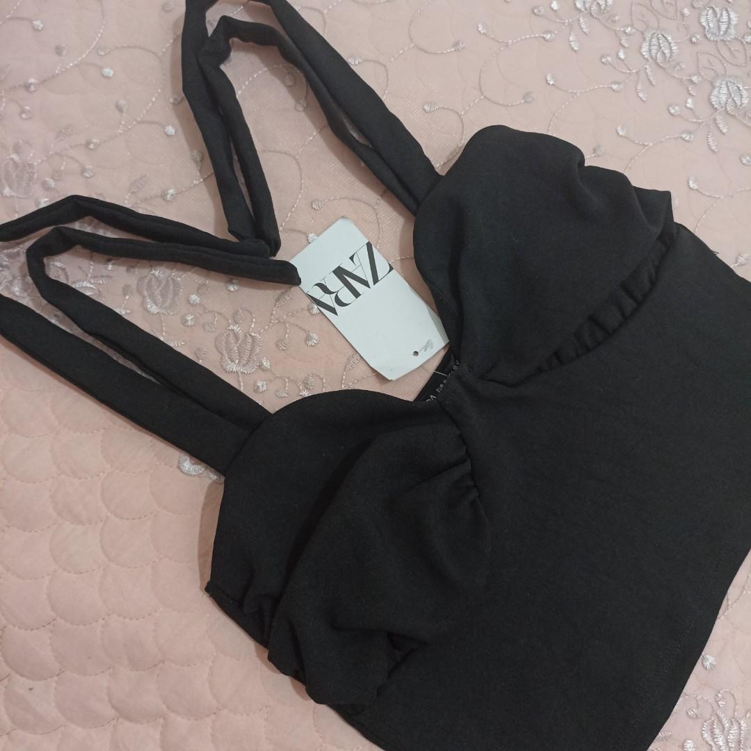 Black Sexy Boob Tie Top (Category: Sleeveless) located in Valenzuela. Submitted by Pretty_Thrifted_Trends (Listing ID 1155433729, Image 1). Description: Hello pretty chic♡ •This is already washed and ready to use. •Please manage your expectations, this is a personal preloved. •Color may vary due lighting. Thank you💐.