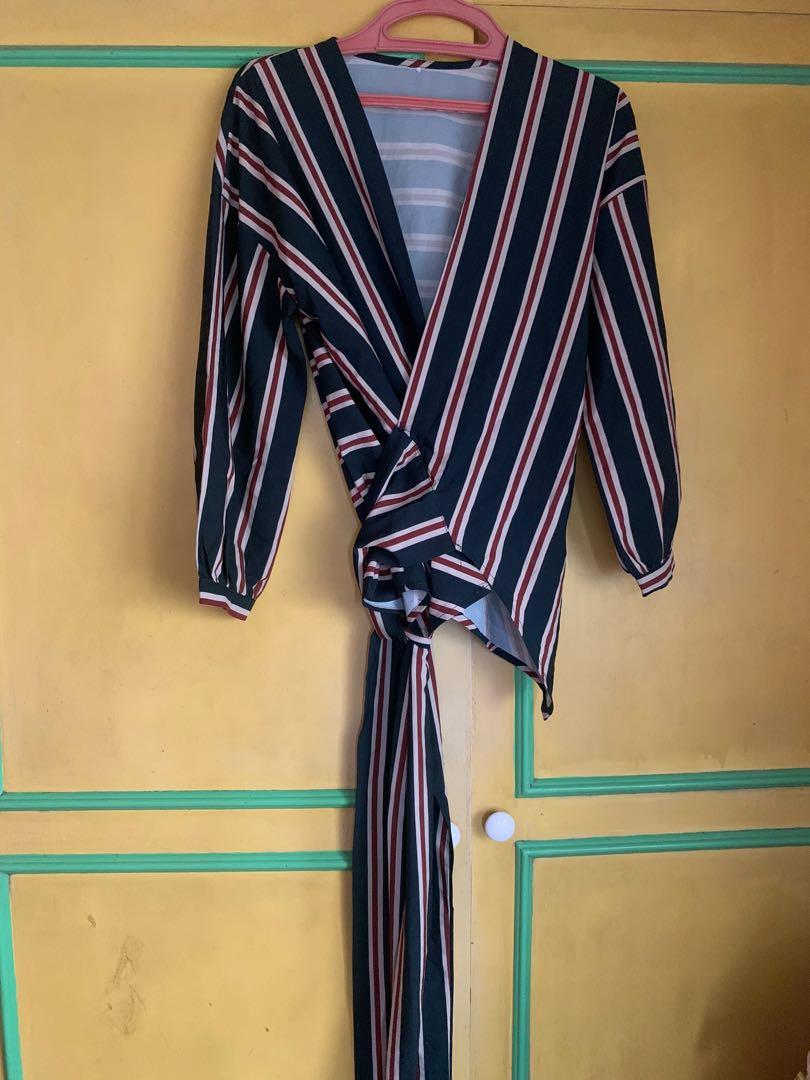 Wrap around pinstripe office top (Category: Others Tops) located in Cainta. Submitted by futurequeensh_jm (Listing ID 1155347531, Image 1). Description: Wrap around pinstripe office top Freesize Color is khaki dark green with beige/maroon stripes.